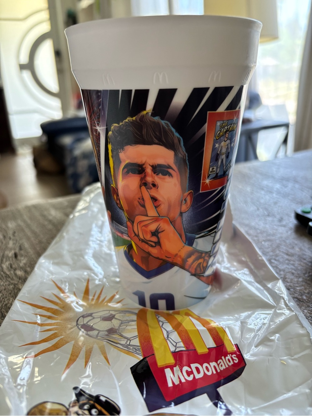 McDonald's White Cup with Multicolor Soccer Player Illustration
